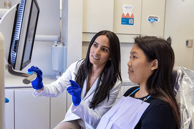 Doctor looking at results with patient.